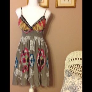 She's cool spaghetti strap dress.